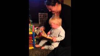 Adorable baby hysterically laughing at book [upl. by Attenad658]