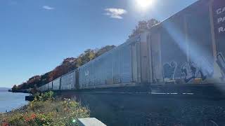 Single unit CSX M269 Autorack train passes Milton landing park MP 68 [upl. by Eidassac]