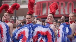 Moulin Rouge dancers perform for cyclists in the Olympics road race [upl. by Aryhs]