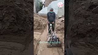 Workers pounding soil with machine construction work [upl. by Yahc]