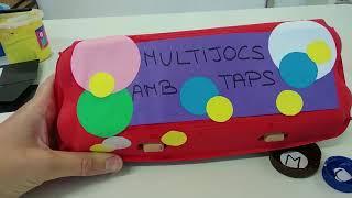 Taller infantil de reciclatge Multijocs amb taps [upl. by Suollecram]