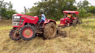 Mahindra tractor stuck in mud pulling out by another Mahindra tractor  tractor [upl. by Ollayos110]