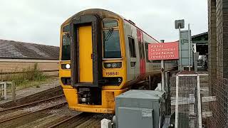 Barmouth Level Crossing Transport For Wales train leaving the station Bank Holiday Monday 26824 [upl. by Lourdes]