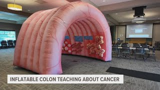 Colin the Inflatable Colon teaches about colon cancer other diseases [upl. by Aryajay]