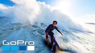 GoPro Surviving Giant Nazaré with Kai Lenny [upl. by Parshall54]