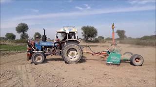 Ford 4600 Tractor with Laser Land Leveler [upl. by Eislrahc]