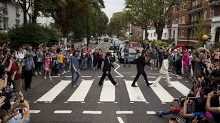 Beatles Abbey Road crossing packed for 45th anniversary [upl. by Fraze]