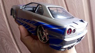 Nissan skyline GTR R34 diecast model car 124 [upl. by Queenie395]