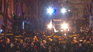 Thousands rally in Georgia after police raid opposition offices  AFP [upl. by Berlinda]