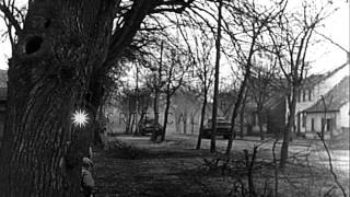 US troops search for German defenders in Haguenau France during World War II HD Stock Footage [upl. by Greerson]