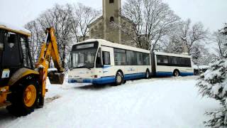 Árokba csúszott busz mentése traktorral Vépen  20130114 [upl. by Eidderf370]