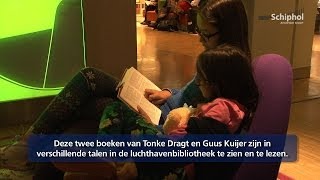 Expositie van vertaalde kinderboeken in Airport Library [upl. by Nnylarak322]