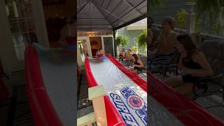 MY TOP FLEW OFF 😱😱😱😱 on INSANE backyard WATERSLIDE challengeaccepted waterslide [upl. by Igiul]