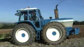 County 1884 Tractor using an 8 Furrow Reversible Plough [upl. by Combe]