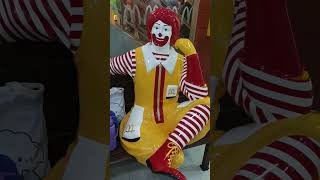 Ronald McDonald statue on a bench Vertical [upl. by Ellynn]