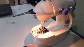 How to Thread a Needle in Portable Mini Sewing Machine [upl. by Perce]