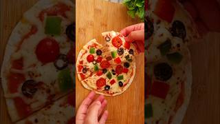 Tortilla pizza recipe trendingshorts viral tortillapizzarecipevegan [upl. by Emoraj]